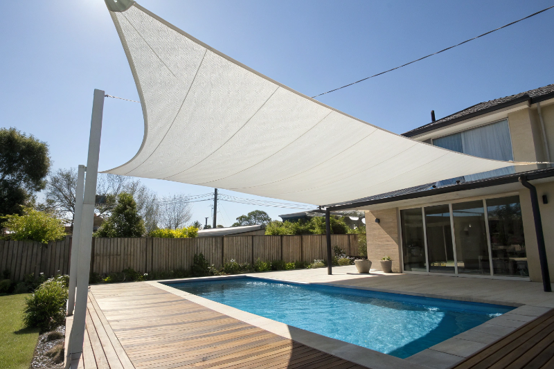 Shade sail installation over pool area Sunshine Coast